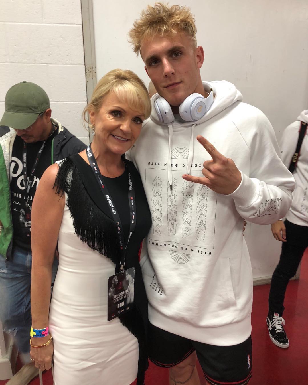 Jake Paul's inner circle, including Logan, a WWE star brother and celebrity parents.