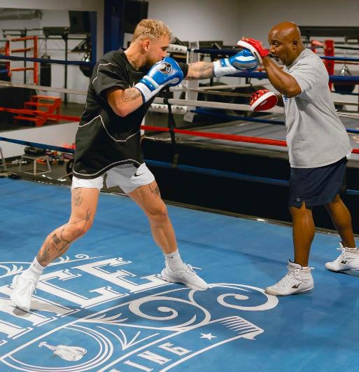 Jake Paul's inner circle, including Logan, a WWE star brother and celebrity parents.