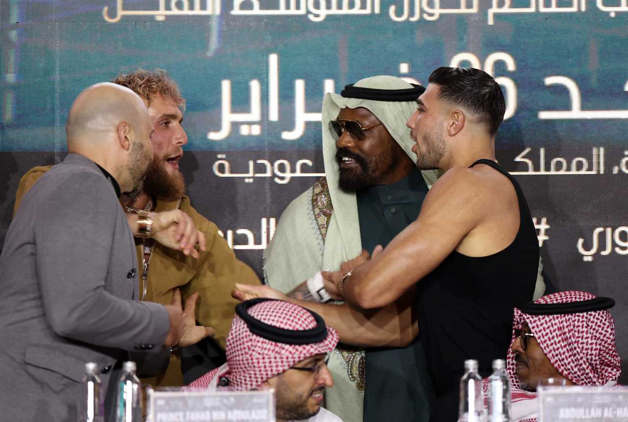 Tyson rival Derek Chisora splits Jake Paul from Tommy Fury as they almost come to blows during a heated press conference