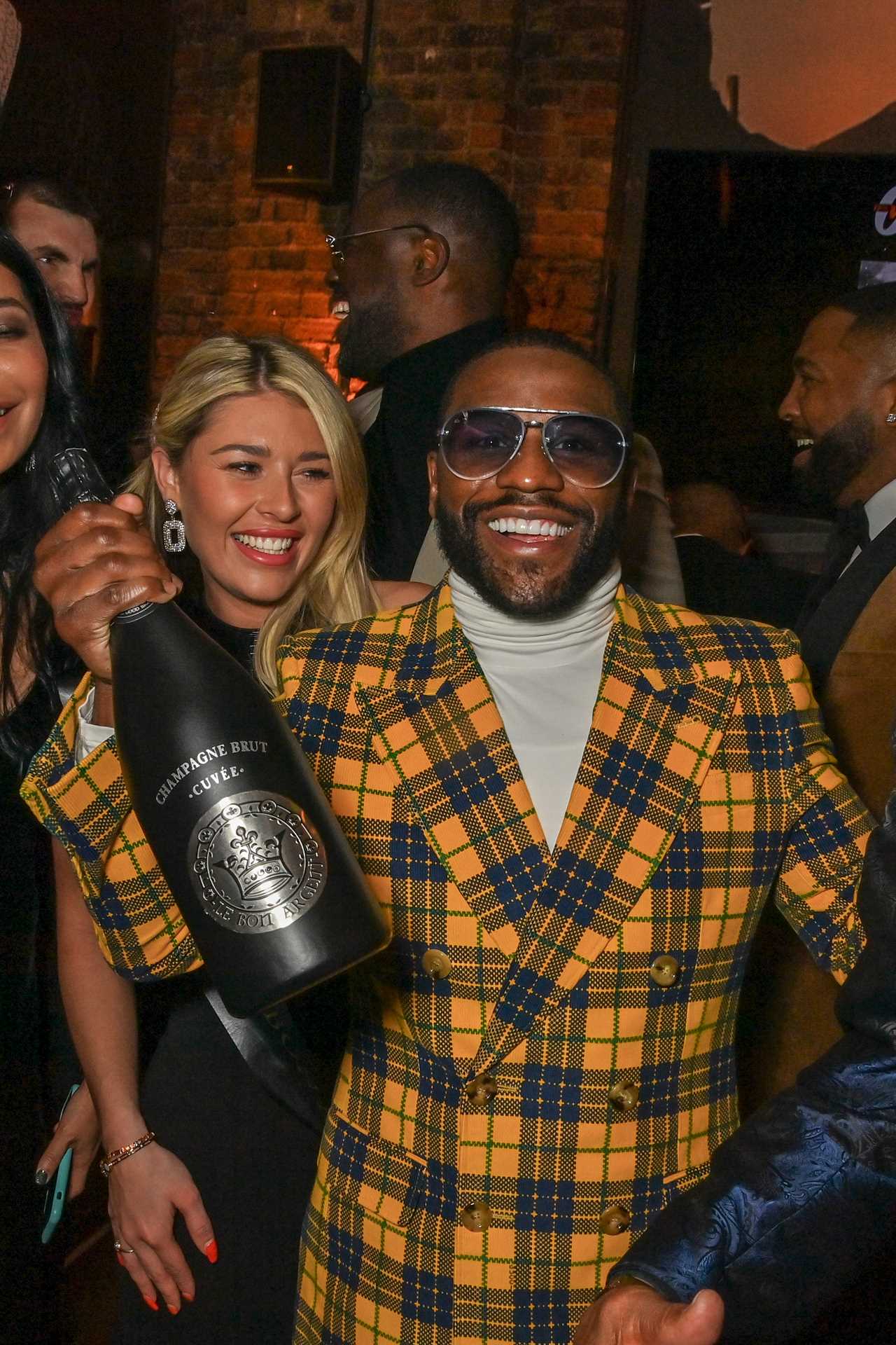 Floyd Mayweather turns 46 in a wild suit, as he visits London restaurant to celebrate ahead of Aaron Chalmers fight