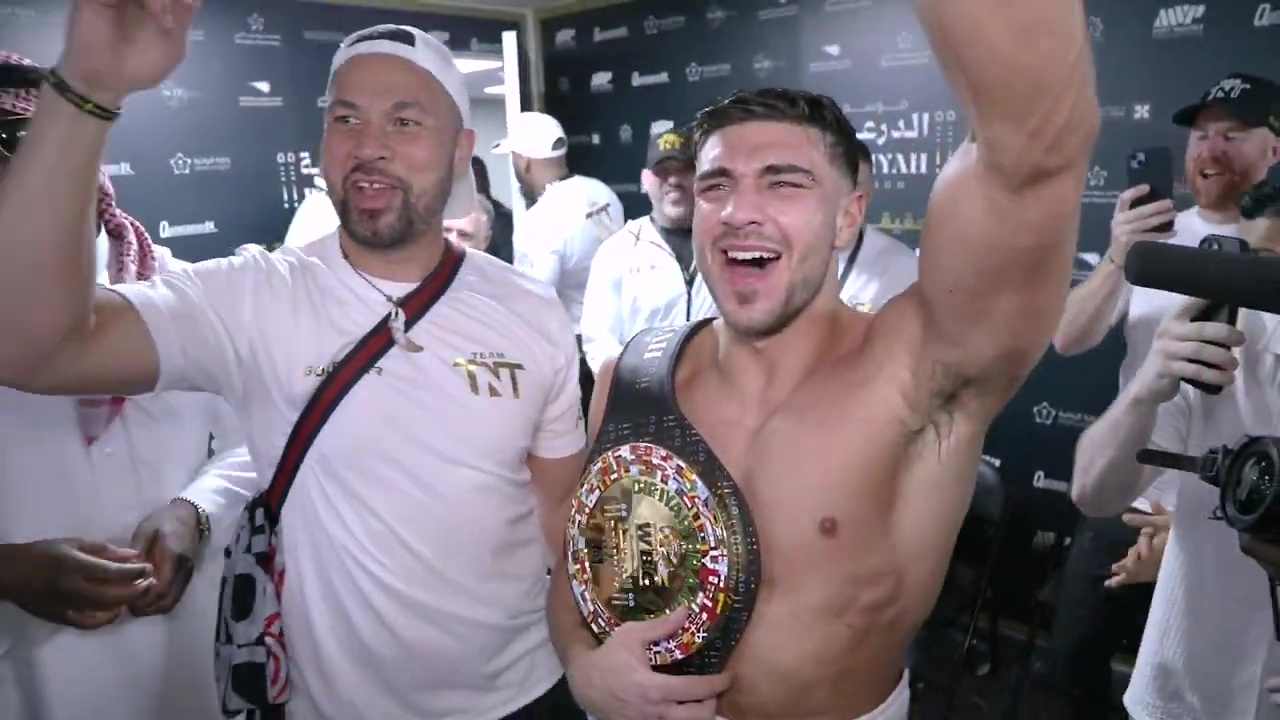 Tommy Fury's wild dressing-room celebrations after Jake Paul win, as Tyson leads chants.
