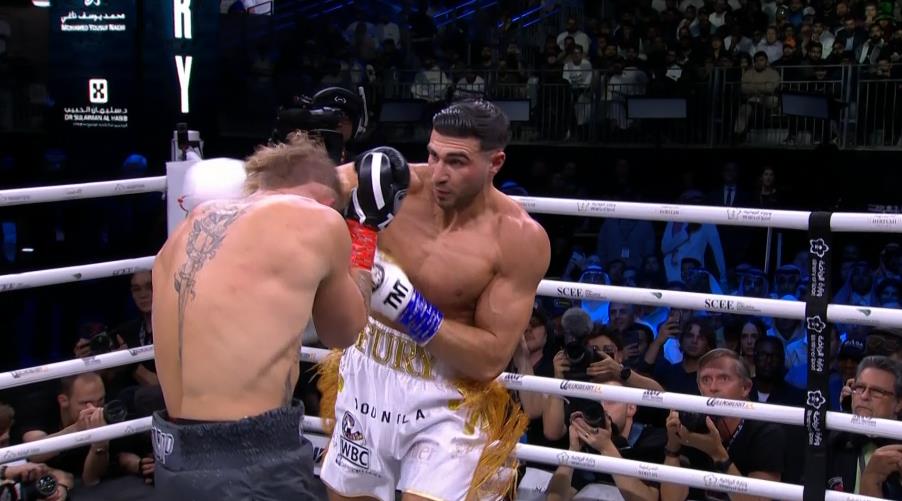Tommy Fury weeps as he wins controversial split decision against Jake Paul after surviving knockdown