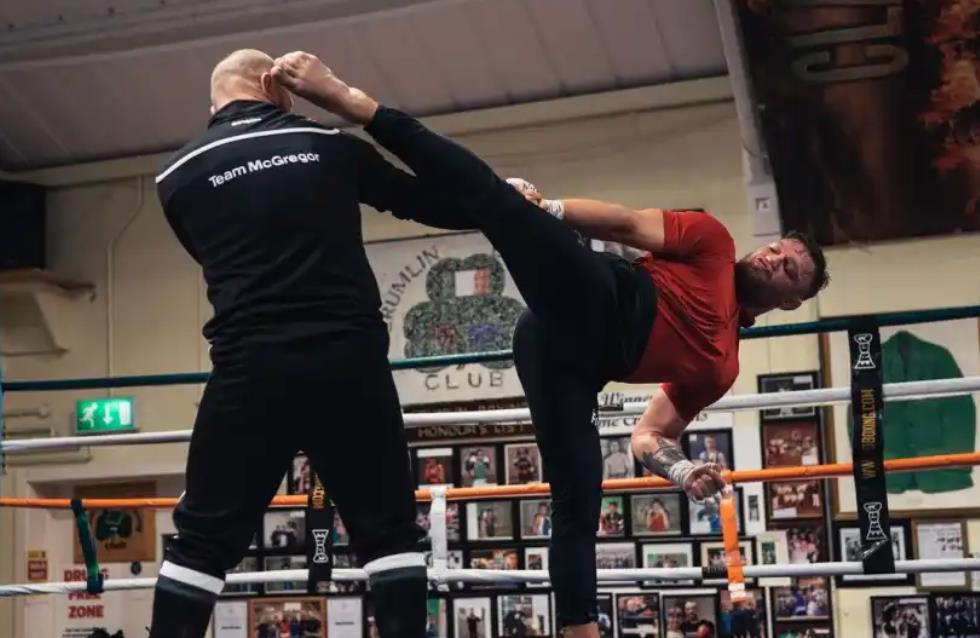 Conor McGregor displays incredible jumping skills with a broken leg during his UFC clash against Chandler