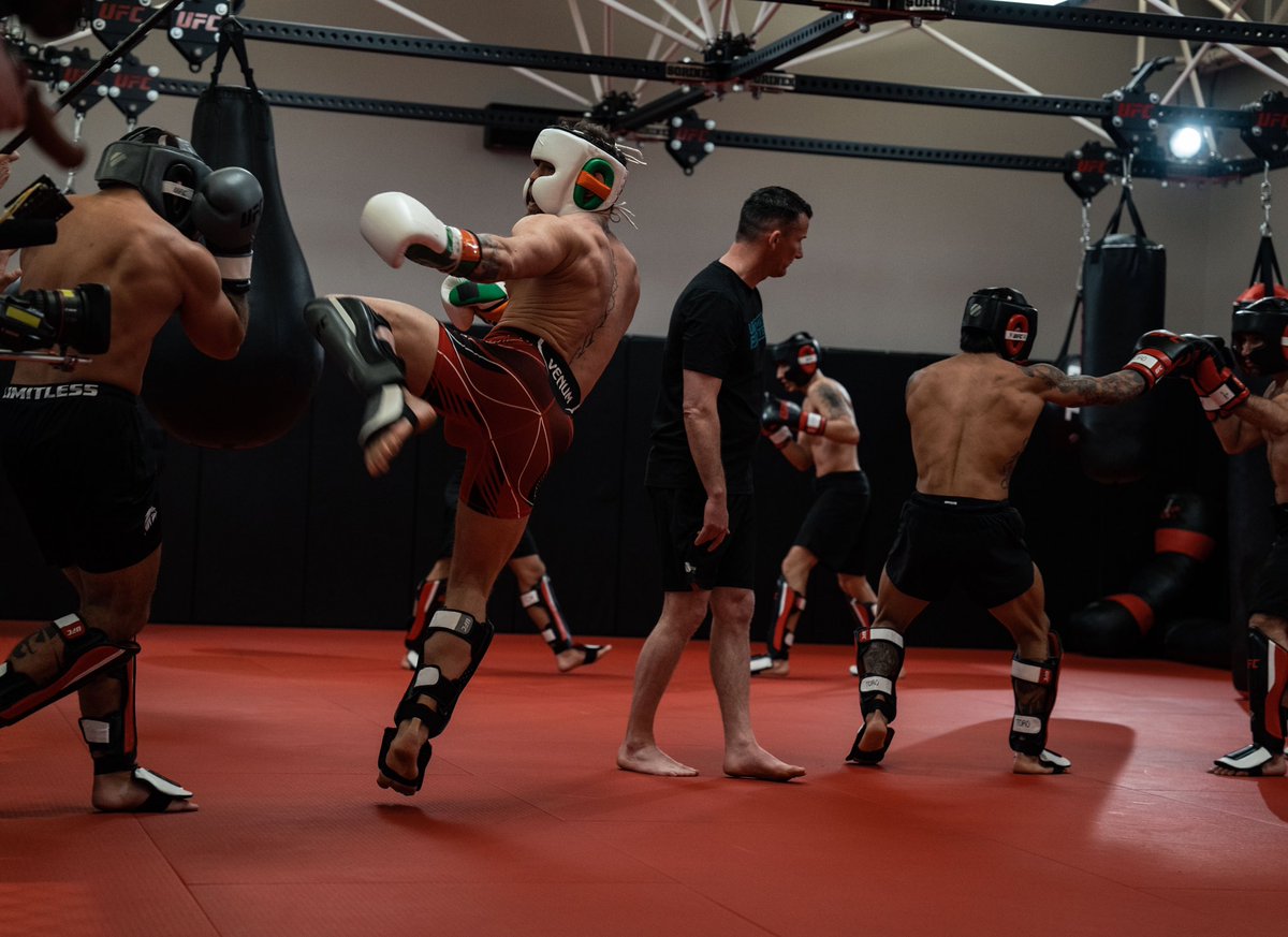 Conor McGregor displays incredible jumping skills with a broken leg during his UFC clash against Chandler