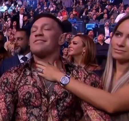 UFC fans were left baffled when Conor McGregor was chest rubbed by Dee Devlin during bizarre scenes on live TV