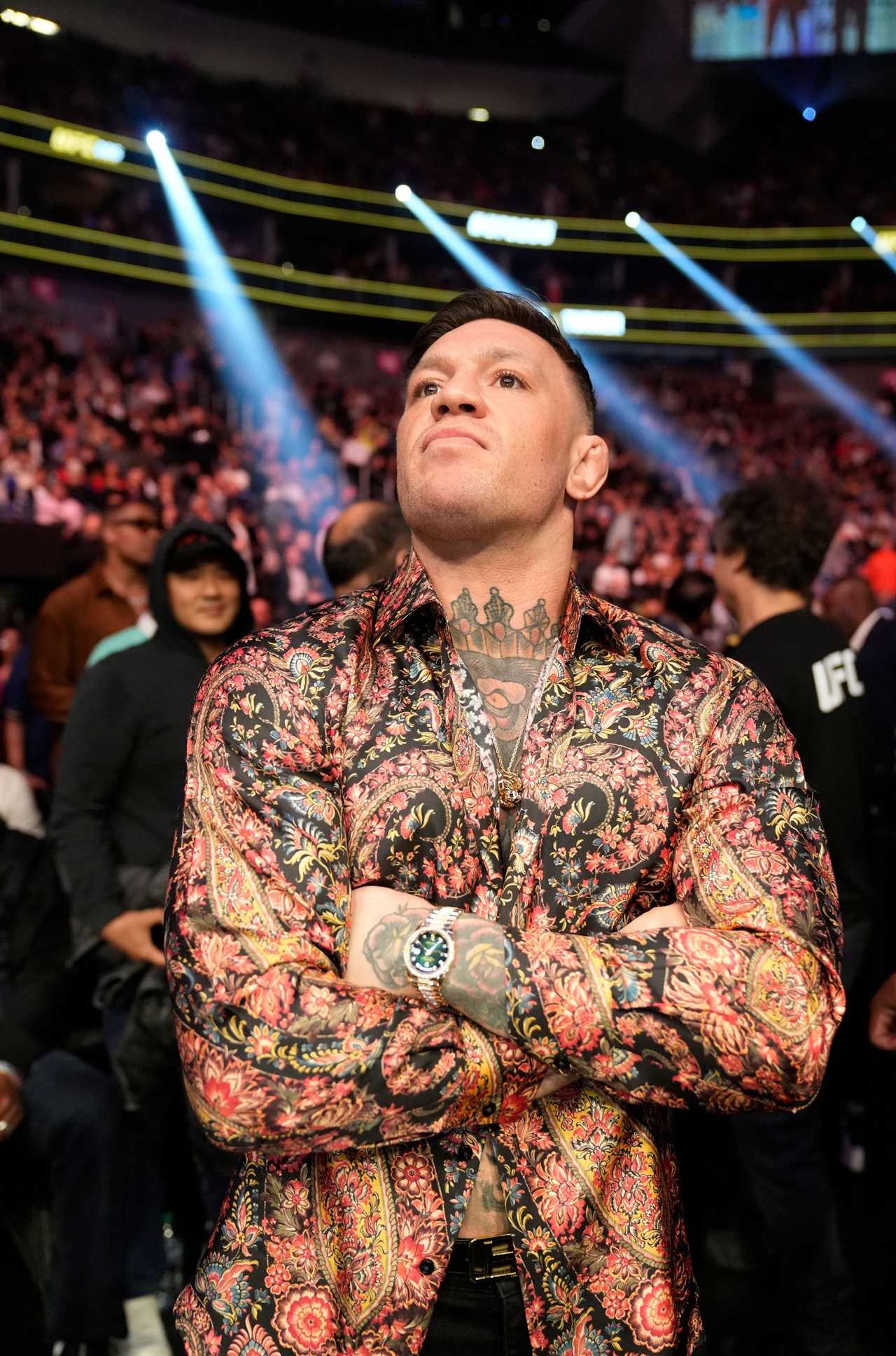 Conor McGregor has a secret chat on-camera with UFC head honcho, in the VIP section. Then, he dances at Jon Jones fight