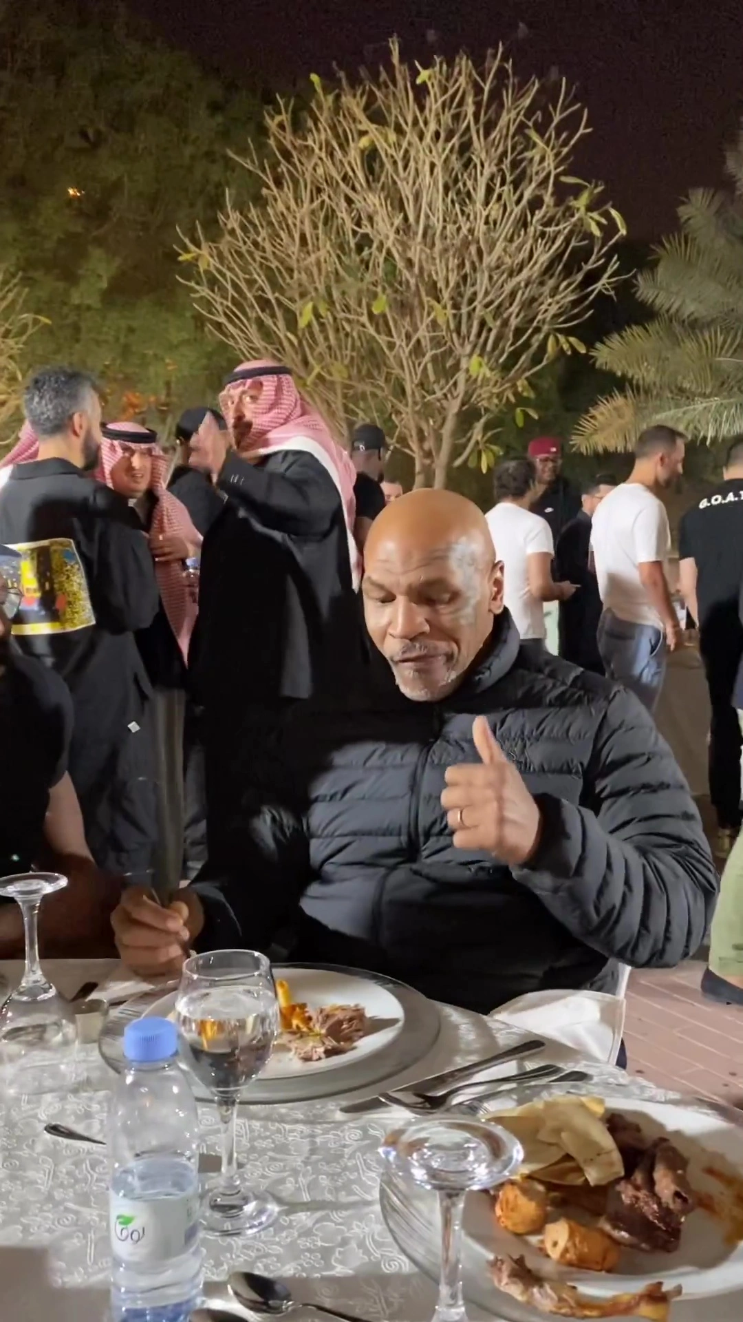 Tyson Fury and father John enjoy dinner with Mike Tyson and Michael Buffer at star-studded tables