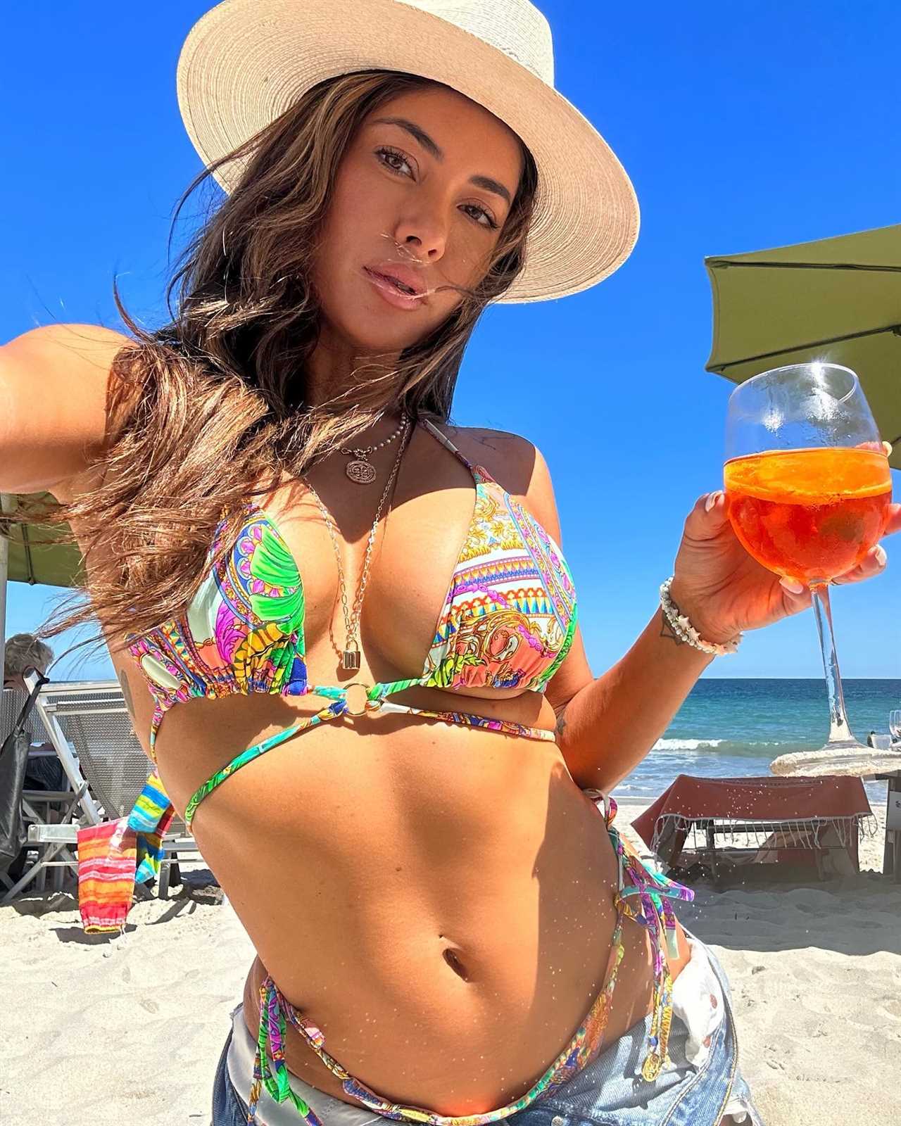 UFC star Arianny Celeste displays incredible figure in tiny bikini, on the beach. Fans call her the'sexiest woman alive.