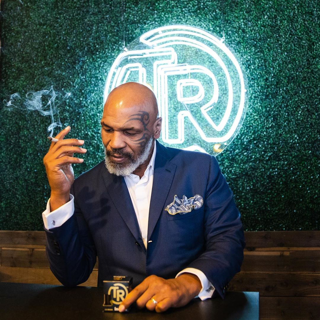 Mike Tyson opens a coffee shop in Amsterdam, and says he's 'tried all the products'.