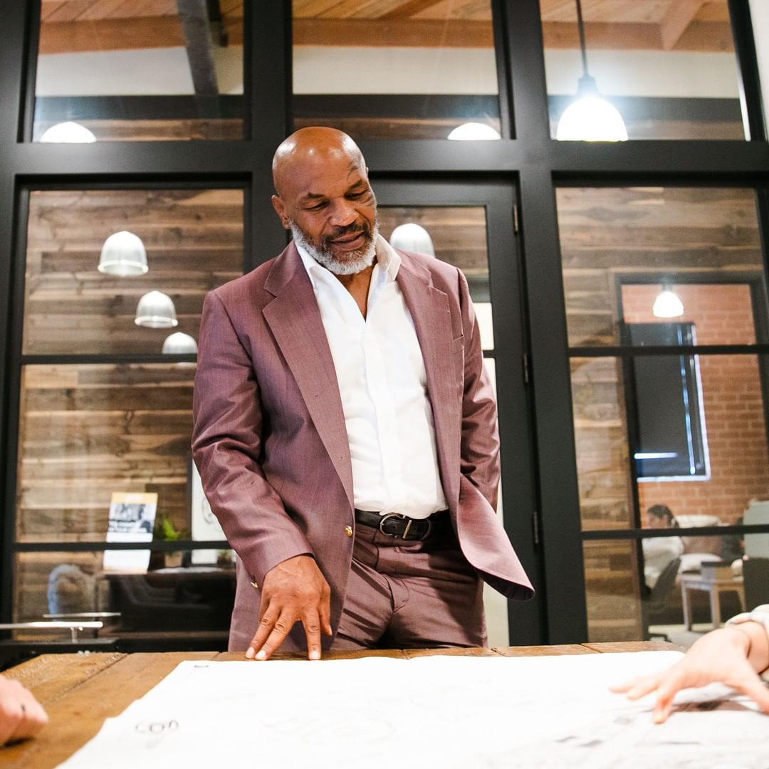 Mike Tyson opens a coffee shop in Amsterdam, and says he's 'tried all the products'.