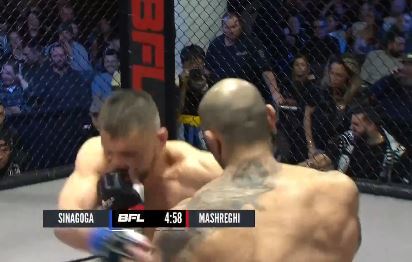 A cheap-trick MMA fighter at the start of a fight is instantly rewarded with instant karma when he's KO'd seconds later