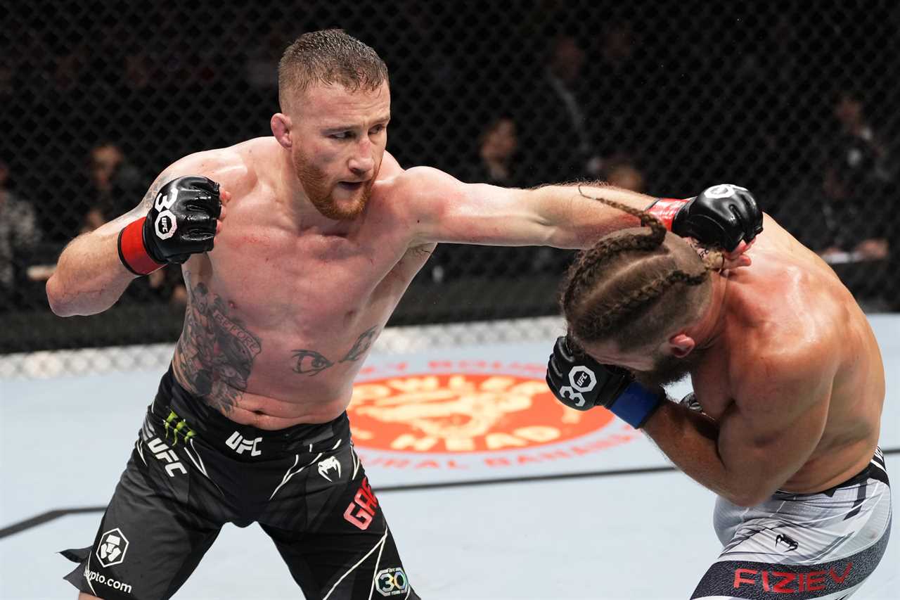 LONDON, ENGLAND - MARCH 18: (L-R) Justin Gaethje punches Rafael Fiziev of Kazakstan in a lightweight fight during the UFC 286 event at The O2 Arena on March 18, 2023 in London, England. (Photo by Jeff Bottari/Zuffa LLC via Getty Images)