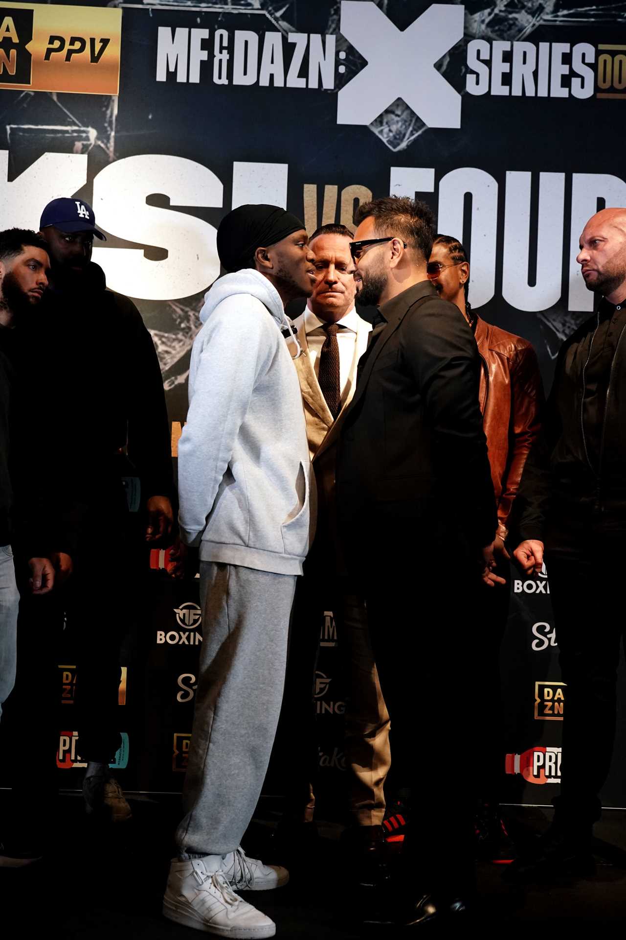 After a heated press conference, Joe Fournier shoves KSI as the YouTuber apologizes for using a vile racial slur.