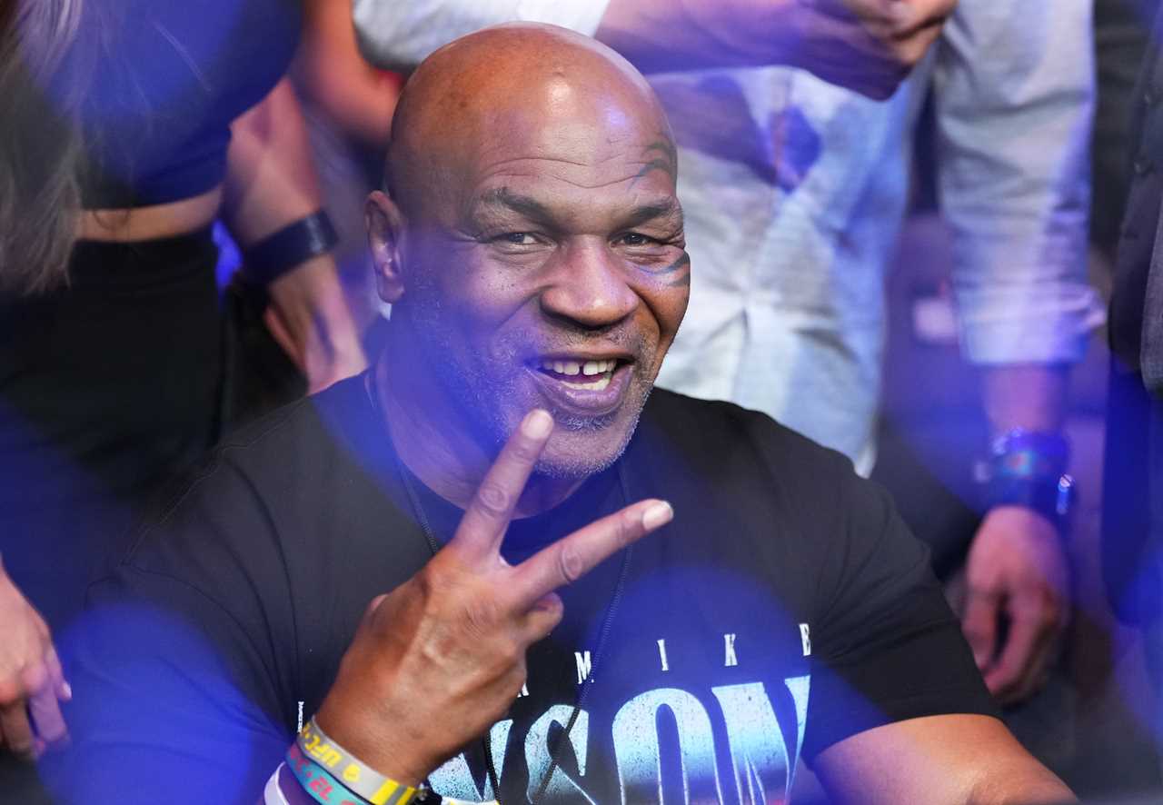Donald Trump is wildly cheered at by UFC fans as Mike Tyson sits next him at UFC 287 following Stormy Daniels' indictment