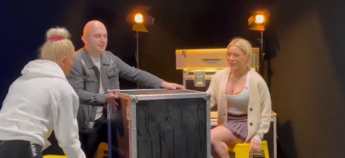 Elle Brooke's face-off with rival descends into chaos as she is dragged to the floor and kicked after throwing a glass of water at her opponent's face