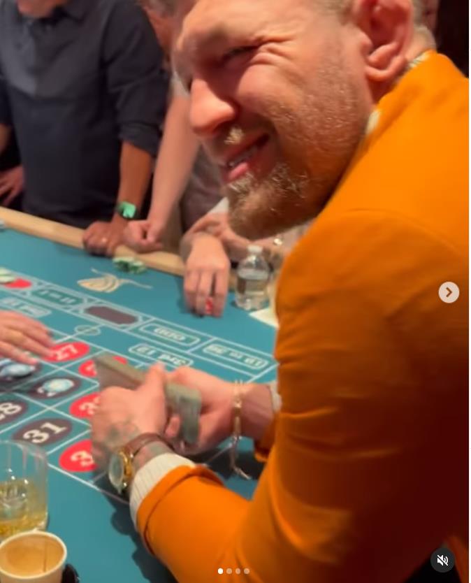 Conor McGregor flashes a huge amount of money while on a gambling spree during his lavish Las Vegas vacation.
