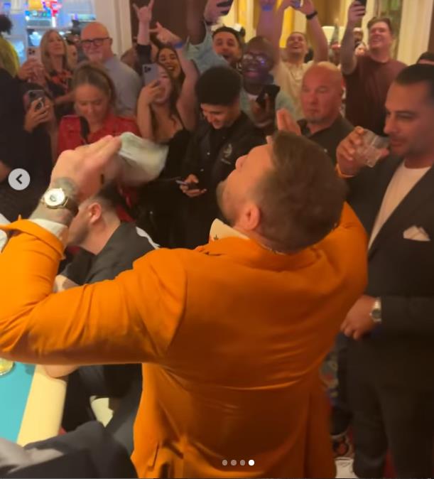 Conor McGregor flashes a huge amount of money while on a gambling spree during his lavish Las Vegas vacation.