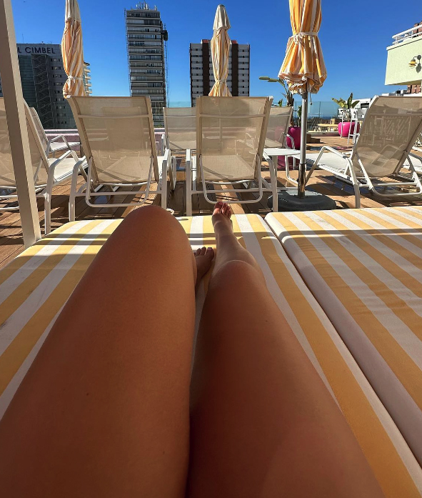 Apollonia Lewellyn shows off her legs in a barely-there bikini as fans go wild.