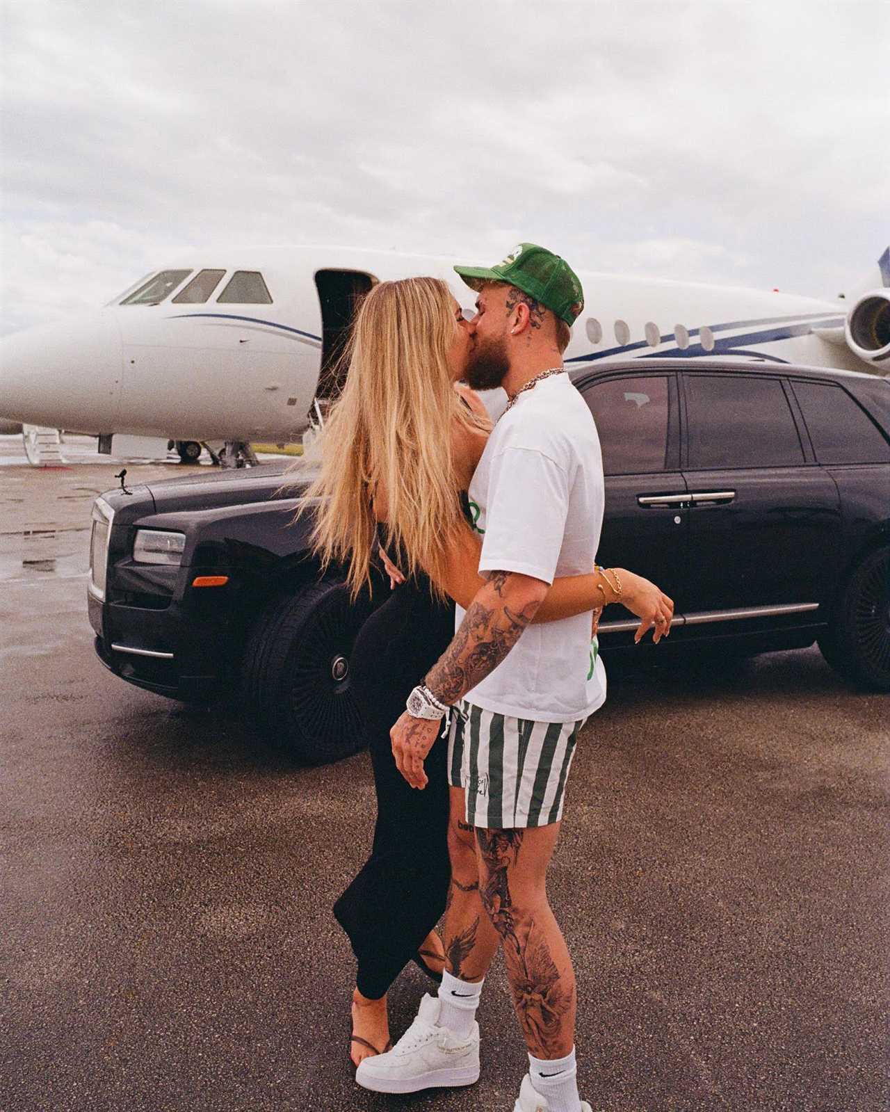 Jake Paul poses with the world's most beautiful speed skater and his pet dog outside his private jet.