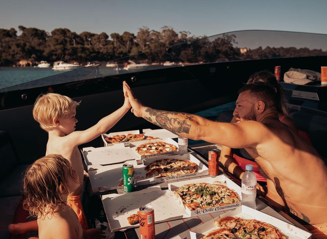 Conor McGregor celebrates his son's 7th birthday with Kermit the Frog cake, pizza on a yacht and a Kermit The Frog party.