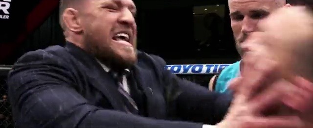 Conor McGregor slaps Michael Chandler on the face while filming TUF 31 as Dana White's teaser footage airs