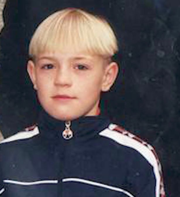 Conor McGregor shares a photo of his son who is a double of himself as a child and says, I've woken as my younger me.