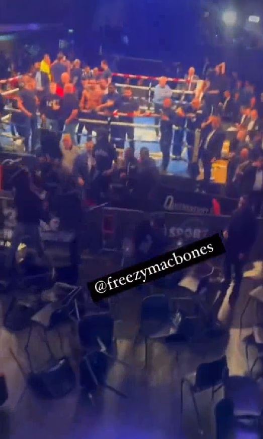 York Hall crowd descends in a frightening brawl after man is knocked down by a flying chair, with onlookers yelling