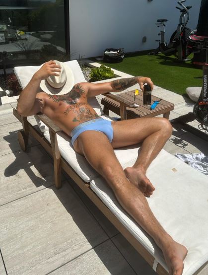 Conor McGregor snoozes in only Versace underwear, but fans joke that the UFC star's pants resemble a G-String