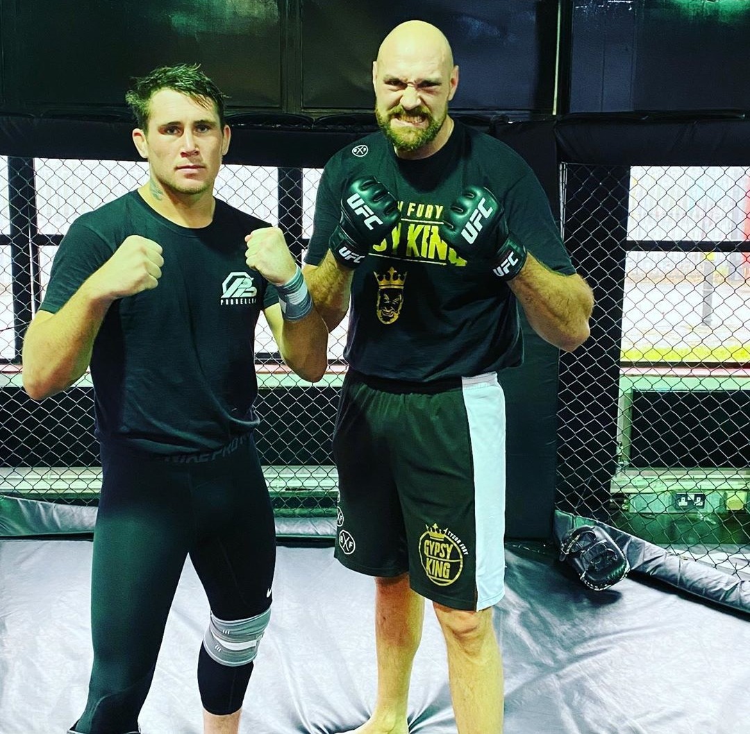 Conor McGregor challenges Tyson Fury, the boxing star who vowed to fight Francis Ngannou, to step into a cage.