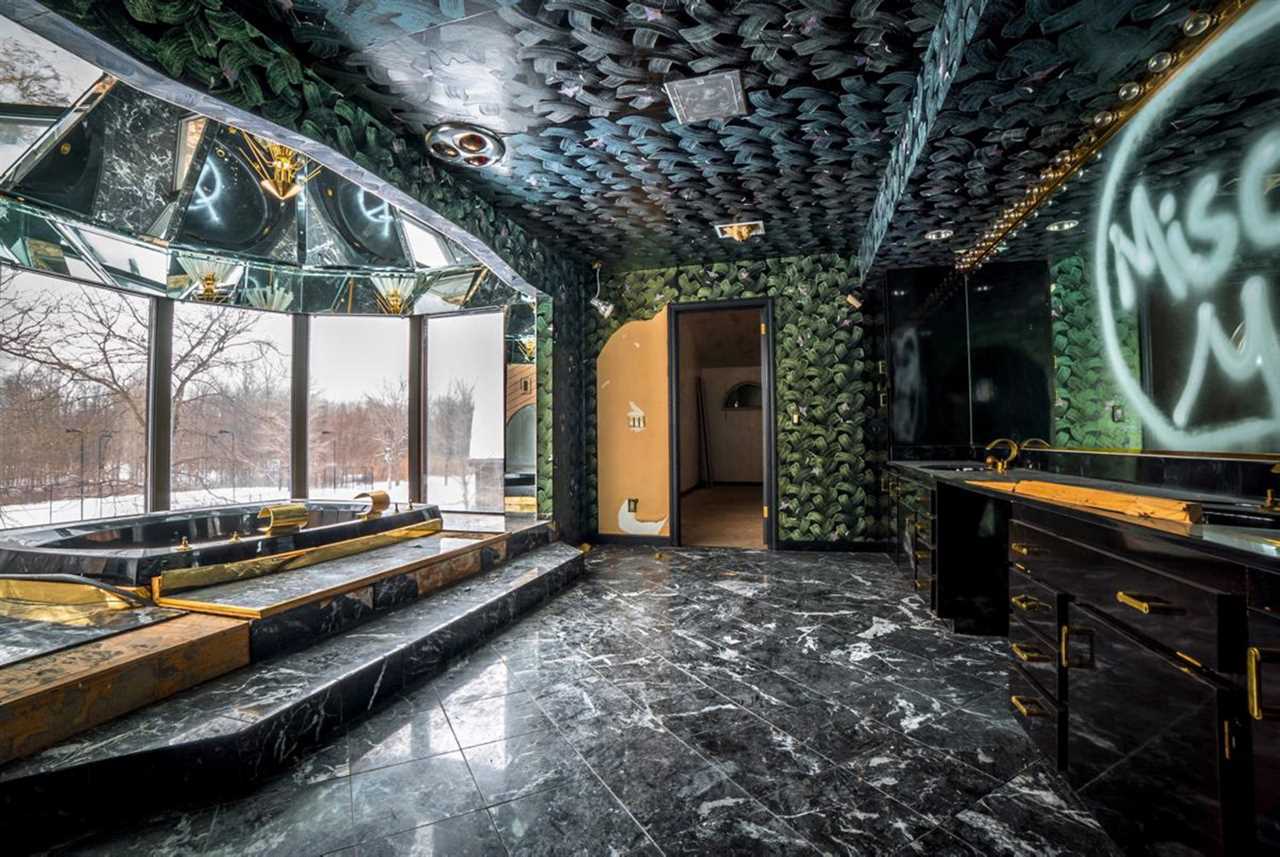 The house was decked out with chandeliers and tiger cages in its prime