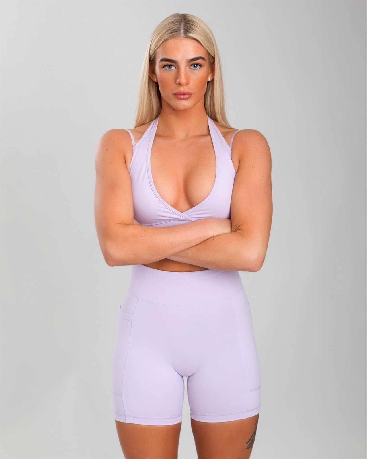 Sammy-Jo Luxton, MMA and OnlyFans' star, sends fans wild with a low-cut top while she asks them for ideas.