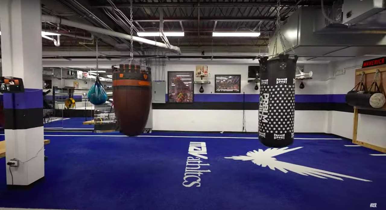 The two-story warehouse gym of Jake and Logan Paul in Puerto Rico, built for $4 million with a boxing ring and weights.