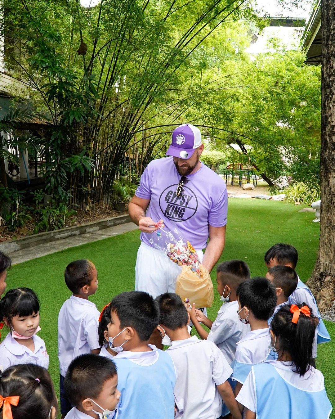 Tyson Fury reveals softer side when he visits orphanage in Bangkok and 'humbles' himself. He shares heartwarming message