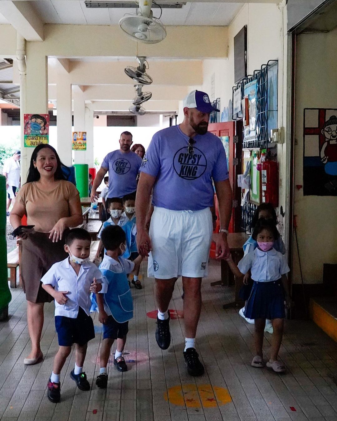 Tyson Fury reveals softer side when he visits orphanage in Bangkok and 'humbles' himself. He shares heartwarming message