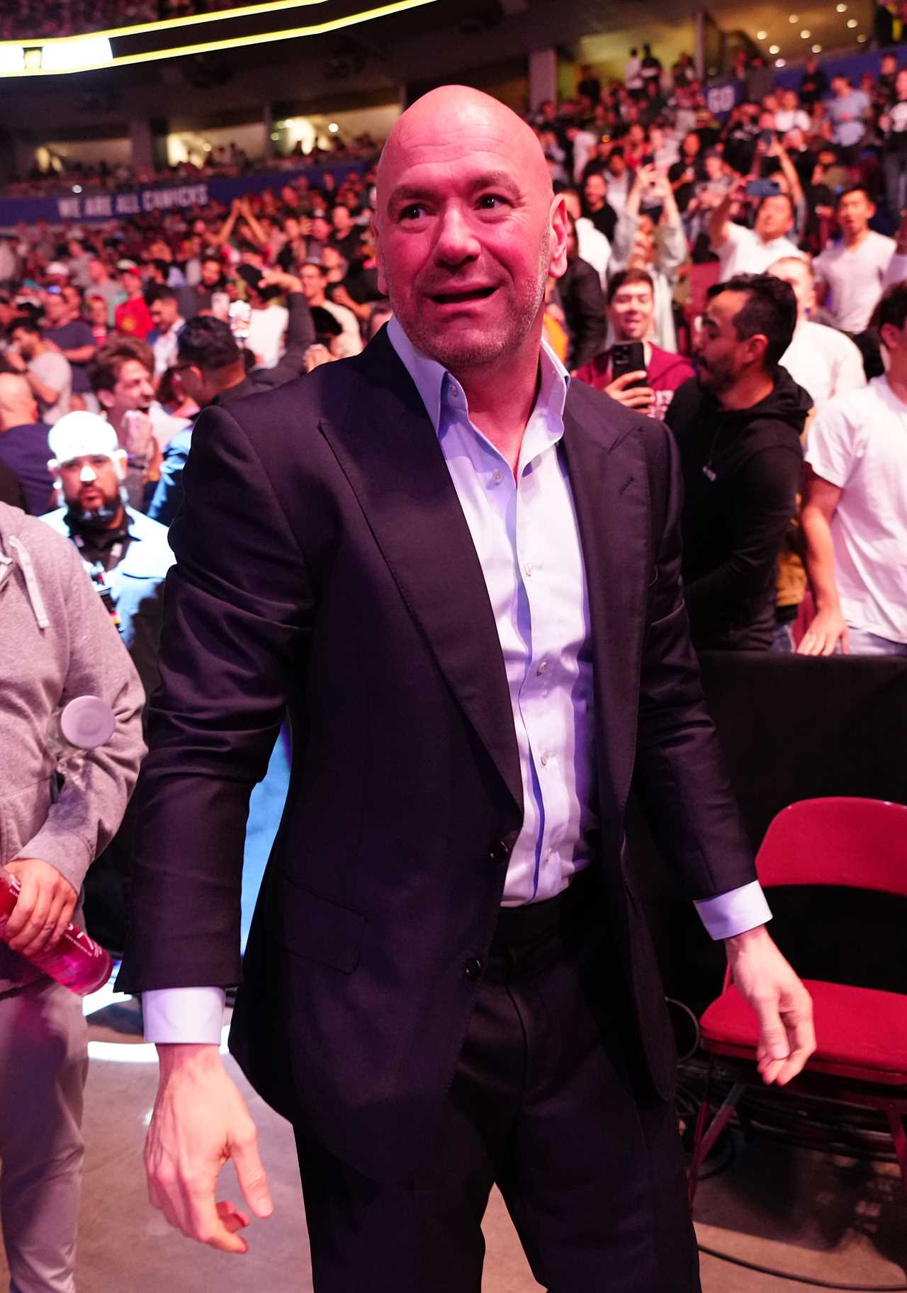 UFC 289 spectators almost fall on fighter doing octagon walking as railing collapses.