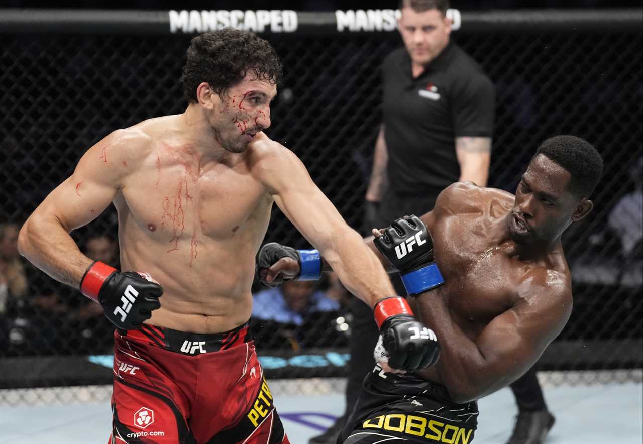 ABU DHABI, UNITED ARAB EMIRATES - OCTOBER 22: (L-R) Armen Petrosyan of Russia punches AJ Dobson in a middleweight fight during the UFC 280 event at Etihad Arena on October 22, 2022 in Abu Dhabi, United Arab Emirates. (Photo by Chris Unger/Zuffa LLC)