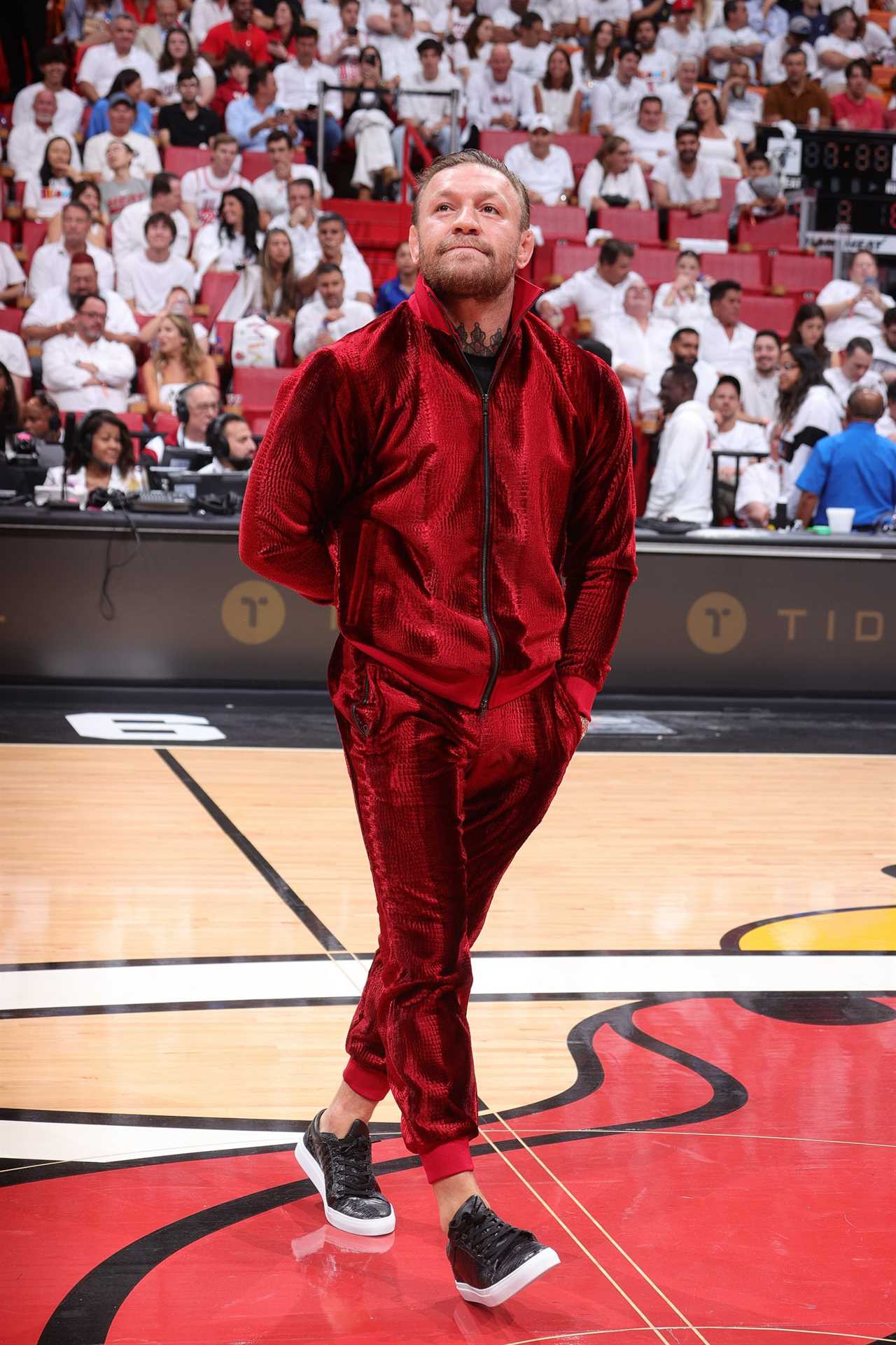 Conor McGregor is filmed leading a woman to the bathroom by her hand before an alleged rape in the NBA Finals