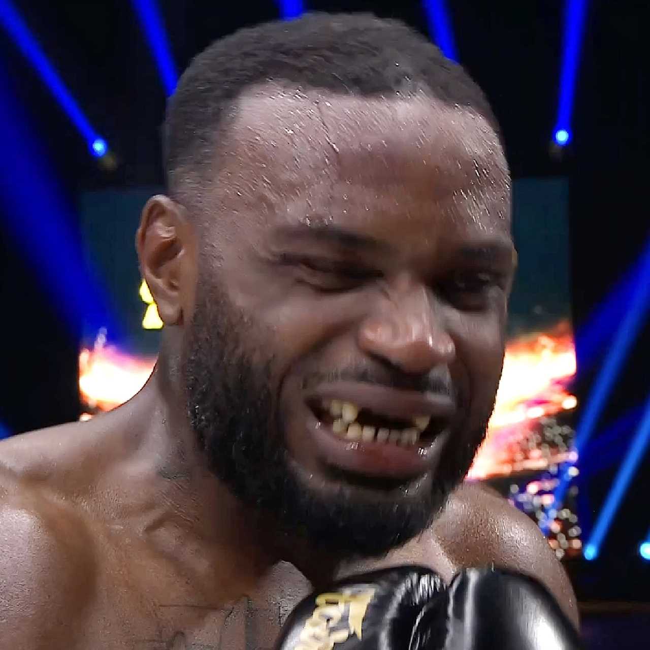 Just two minutes after the fight, a kickboxer's front row of teeth is knocked out. The gnashers are scattered on the floor.