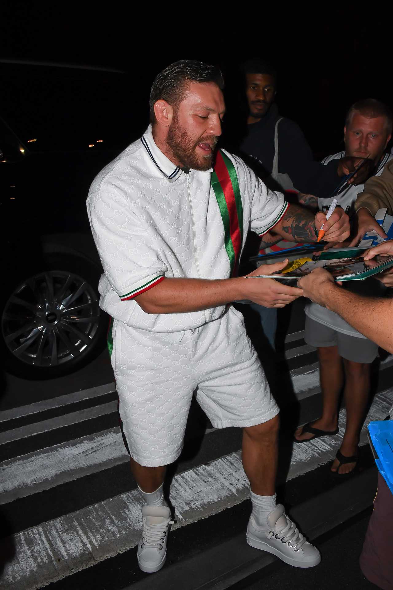 Conor McGregor signs autographs & breaks cover in NYC, days after MMA superstar is accused of sexual abuse at NBA Final