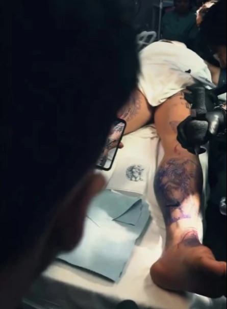 Jake Paul is put to sleep as he gets 11 painless tattoos, and fans are left wondering 'how can you get an appointment?'