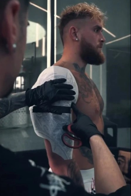 Jake Paul is put to sleep as he gets 11 painless tattoos, and fans are left wondering 'how can you get an appointment?'