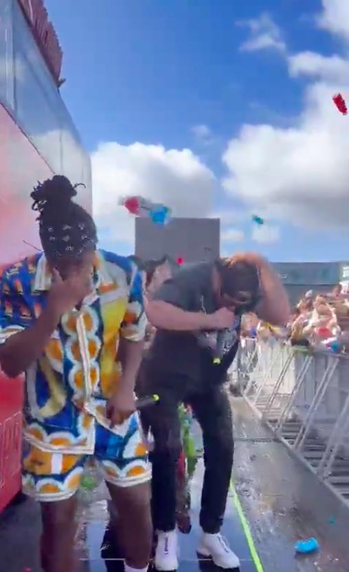 Watch KSI & Logan Paul getting pelted by bottles of Prime during drinks launch. Security rushes in to protect the pair