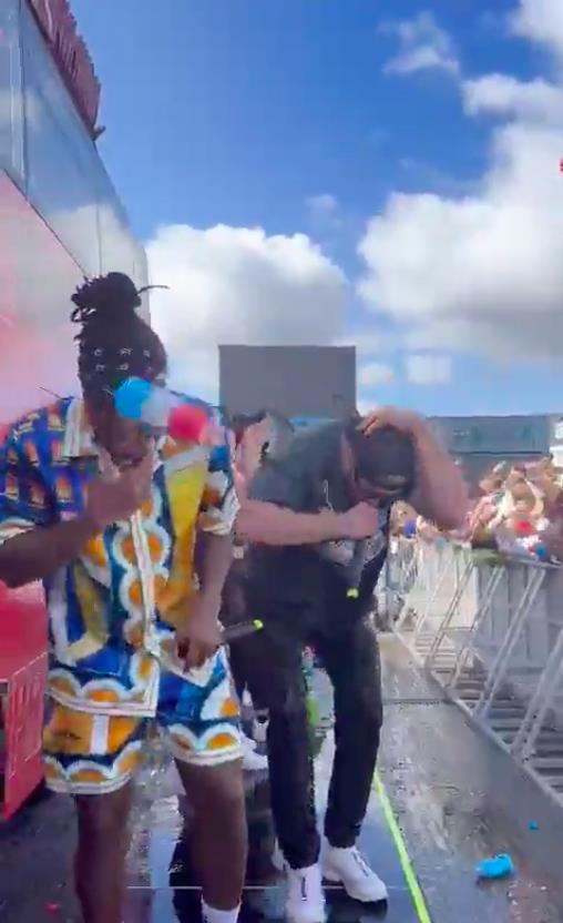 Watch KSI & Logan Paul getting pelted by bottles of Prime during drinks launch. Security rushes in to protect the pair