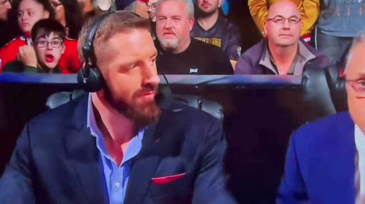 WWE fans scream as a young fan 'follows the proper British tradition' by making an X-rated gesture during SmackDown London