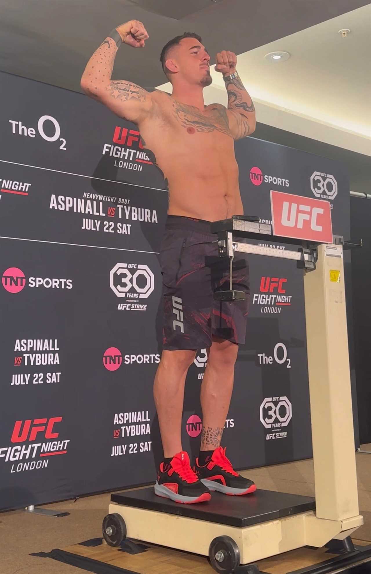 Tom Aspinall weighs in as a career heavy for the match against Marcin Tybura