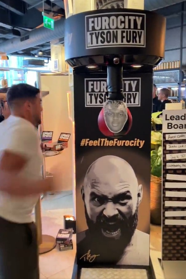 Tommy Fury Swings at KSI’s Face on Punch Machine during Furocity Event