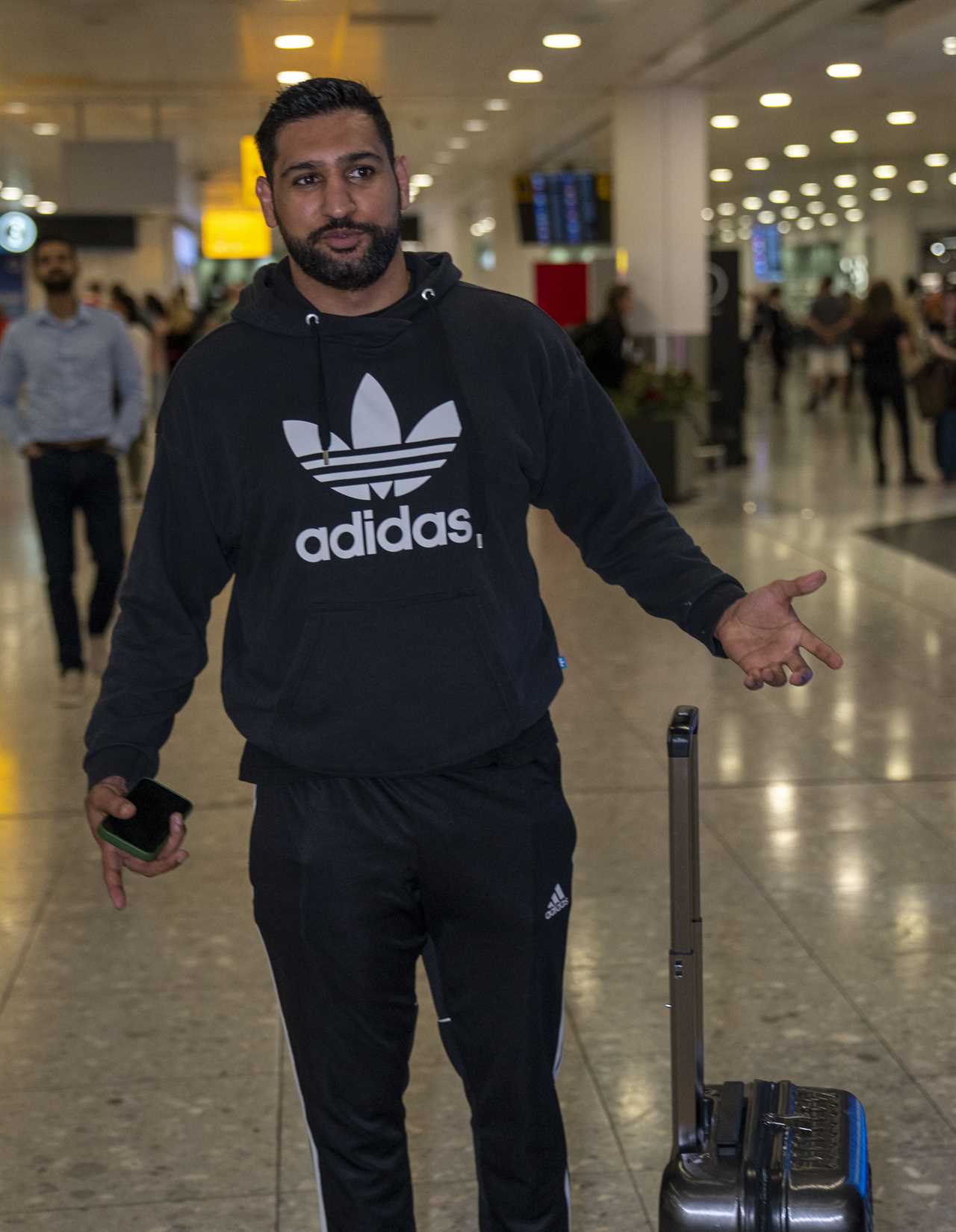 Amir Khan's marriage plunges into a new crisis after woman claims they romped in hotel during four-month fling