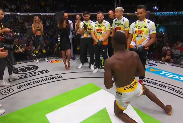 MMA star proposes to girlfriend live on TV after brutally breaking his foot in fight