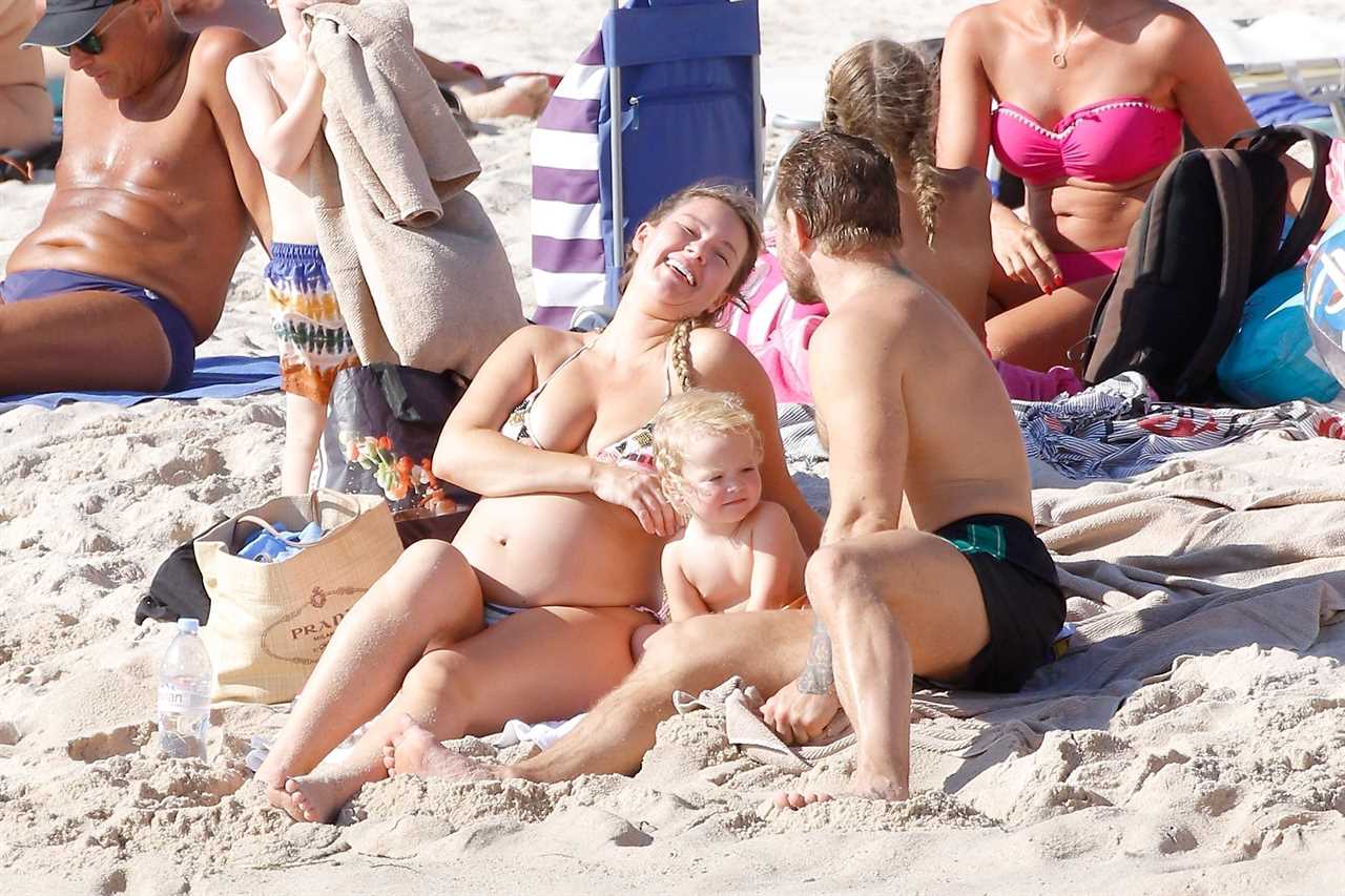Conor McGregor and his pregnant fiancée Dee Devlin show PDA on French Beach