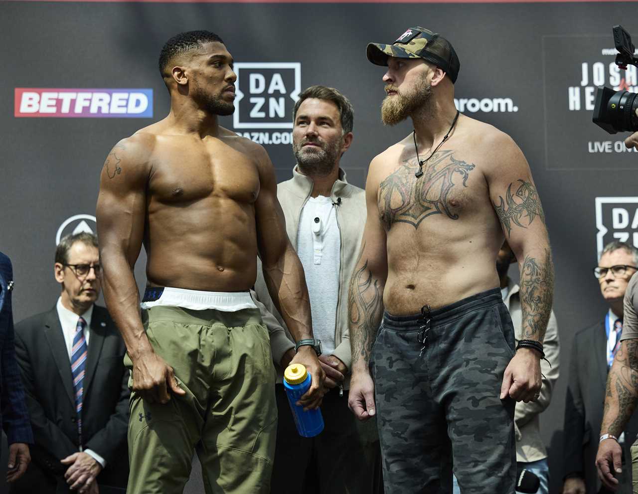 Anthony Joshua vs Robert Helenius nearly COLLAPSED, with Brit accused of f***ing bulls ***' over glove dispute